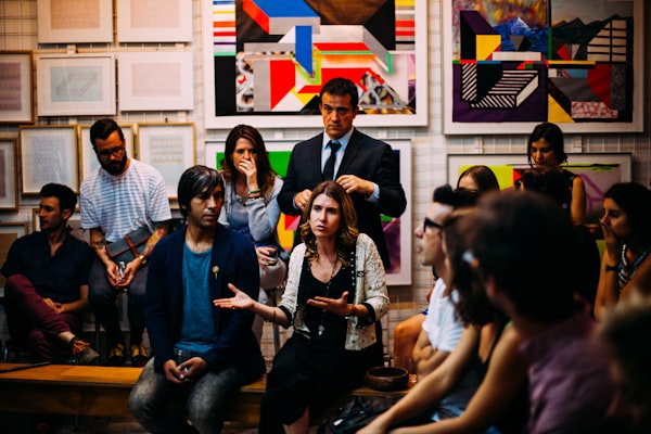 A presenter delivering an interactive lecture to an audience