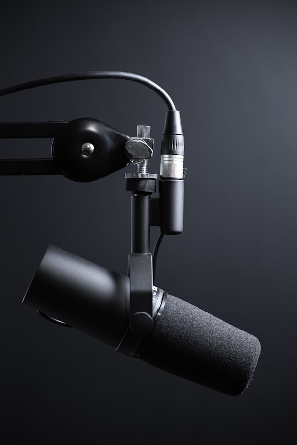 Audio recording setup with a professional microphone representing podcast streams